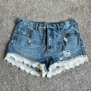 Free People denim shorts with lace detail